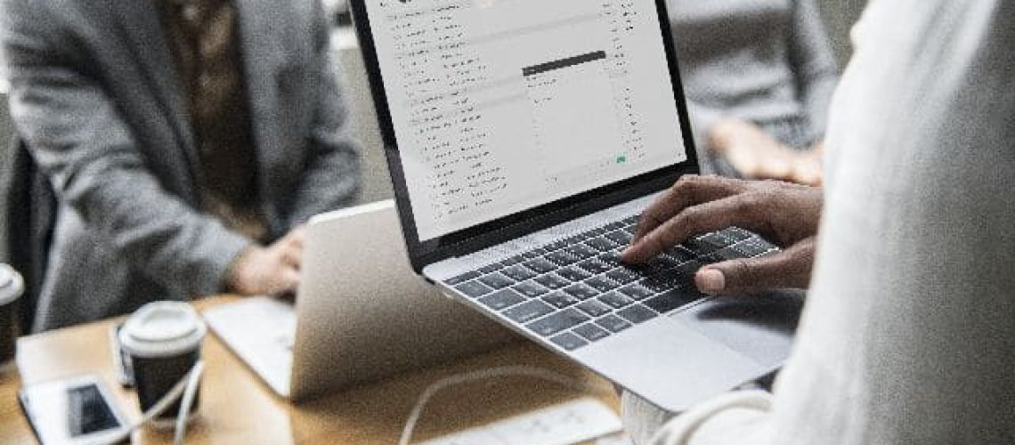 man-checking-his-email-laptop